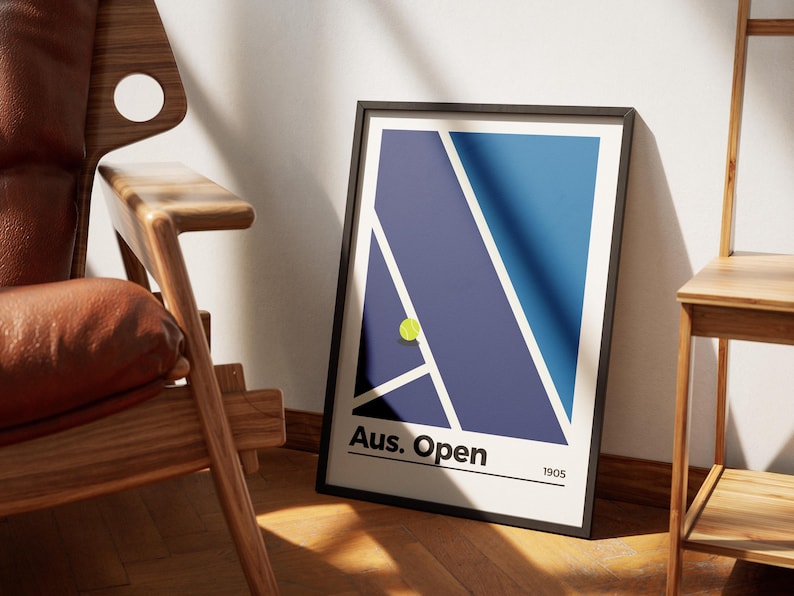 May include: A black framed poster with a blue and purple abstract design of a tennis court. A yellow tennis ball is on the court. The poster says "Aus. Open 1905".