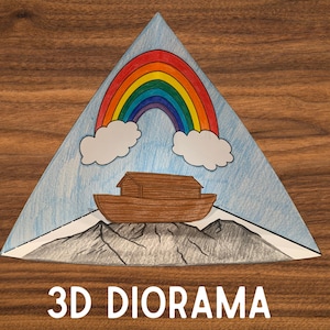 May include: A 3D diorama featuring a brown ark on a mountain, under a rainbow and clouds, set against a light blue sky. The diorama is triangular and has the words "3D DIORAMA" at the bottom.