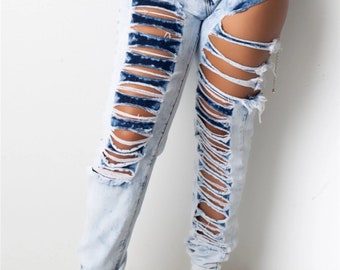 light blue jeans with holes
