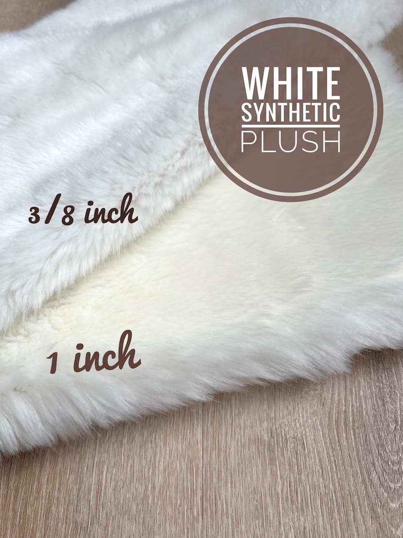 May include: White synthetic plush fabric in two different pile heights. The fabric is shown with a label that reads "WHITE SYNTHETIC PLUSH". The pile heights are labeled "3/8 inch" and "1 inch".