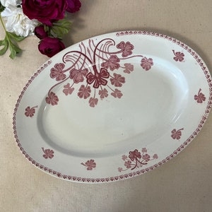 Antique oval serving dish in ironstone, "Lucien" model, from the French manufacturer Luneville