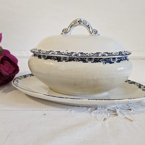 Antique ironware sauceboat “Moustier” model from the French manufacturer of Lunéville