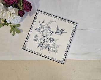 Antique earthenware tile made of iron clay from French manufacture