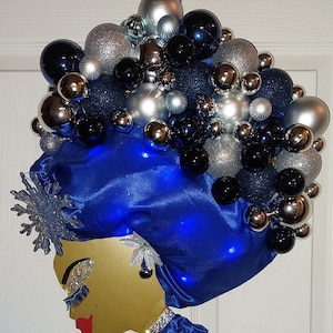 Corona de perfil de diva con luces (azul y plateado)