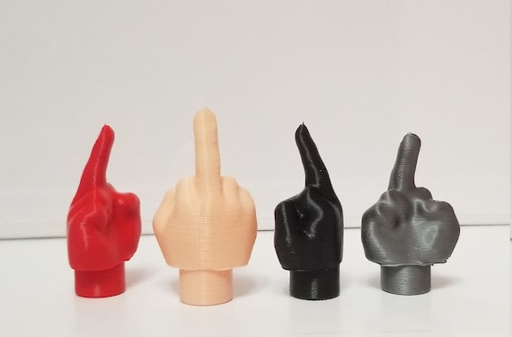 Middle finger valve stem caps discount