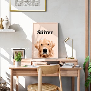 May include: A light pink framed print with a golden retriever dog's head and the word "Shiver" in black text.