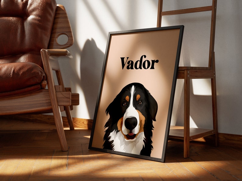 May include: A framed print of a Bernese Mountain Dog with the name "Vador" printed on a peach background.