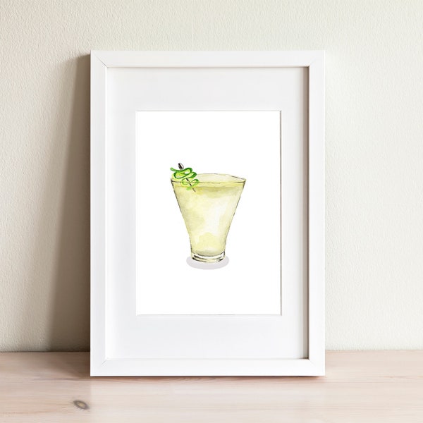Puede incluir: Una pintura de acuarela de un cóctel amarillo en un vaso alto con una guarnición de lima verde. La bebida está en un marco blanco.