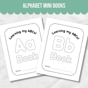 May include: Two white mini-books with black outlines, featuring the letters "Aa" and "Bb". The books are titled "Learning my ABCs!" and "Book". Each book has a space for a name. The top banner reads "ALPHABET MINI BOOKS".