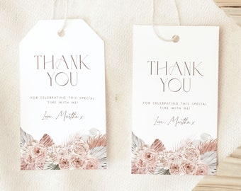 May include: Two white thank you tags with a floral design. The text on the tags reads "Thank You" and "For celebrating this special time with me. Love, Martha x".
