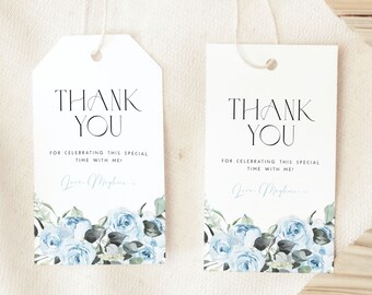 Può includere: Due etichette di ringraziamento bianche con disegni floreali blu e il testo "THANK YOU" e "FOR CELEBRATING THIS SPECIAL TIME WITH ME!"  Love Meghna.