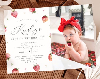 May include: A white card with a red bow and a baby girl in a bathtub with strawberries. The card says "Please join us for Kinsley's Berry First Birthday. Our little strawberry is turning one. August 18, 2-4PM. Kinsley's House, 60 Seabright Avenue, Santa Cruz, California, 95062-3422. Kindly RSVP to Sally 0412 345 678."
