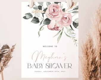 May include: A welcome sign for a baby shower with a floral design featuring pink roses and green leaves. The sign says "Welcome to Meghan's Baby Shower" and "Sunday, November 20th, 2023".