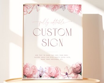 May include: A printable sign with a pink floral border and the text "fully editable CUSTOM SIGN" in a burgundy font. The text below reads "ADD TEXT TO MAKE THE SIGN YOUR OWN. CUSTOM SIGNS CAN GIVE GUESTS EXTRA INFO. MAKE TABLE MESSAGES, ETC."
