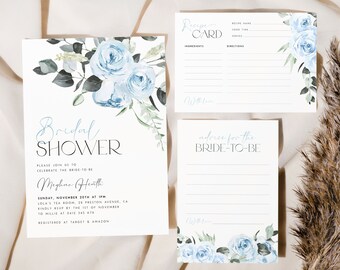 Könnte beinhalten: Eine blaue und weiße florale Einladung zur Bridal Shower mit dem Text "Bridal Shower" und "Meghan Heath". Die Einladung enthält Datum, Uhrzeit und Ort der Shower. Außerdem steht der Text "Registered at Target & Amazon" darauf.