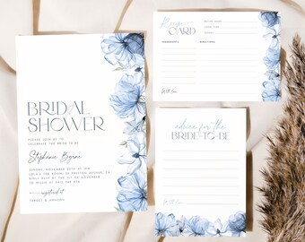 Könnte beinhalten: Eine blaue und weiße florale Einladung zur Bridal Shower mit dem Text "Bridal Shower" und "Please join us to celebrate the bride-to-be Stephanie Byrne". Die Einladung enthält Datum, Uhrzeit, Ort und RSVP-Informationen. Die Einladung enthält auch den Text "Registered at Target & Amazon".