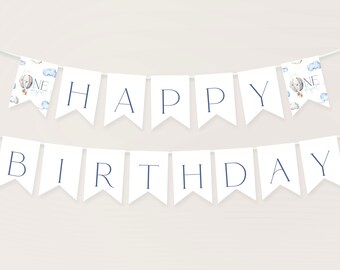 May include: White banner with blue lettering that reads "Happy Birthday". The banner is strung with white string and has a blue hot air balloon design on each end.