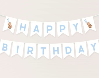 May include: White banner with blue letters spelling "Happy Birthday" with a brown bear holding a blue balloon on each end.