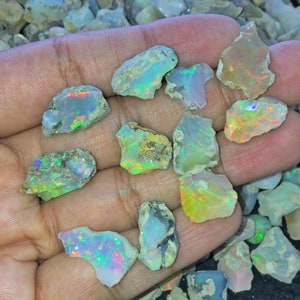 100 Carats Ethiopian Opals Rough 12mm-15mm ,Top Quality Flash on Each Rough, Excellent Play of Colours