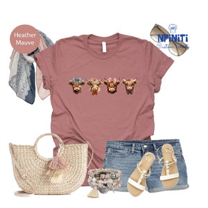 a women's t - shirt, shorts, and purse