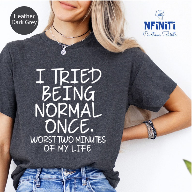 a woman wearing a t - shirt that says i tried being normal once