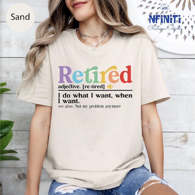 a woman wearing a t - shirt that says retired