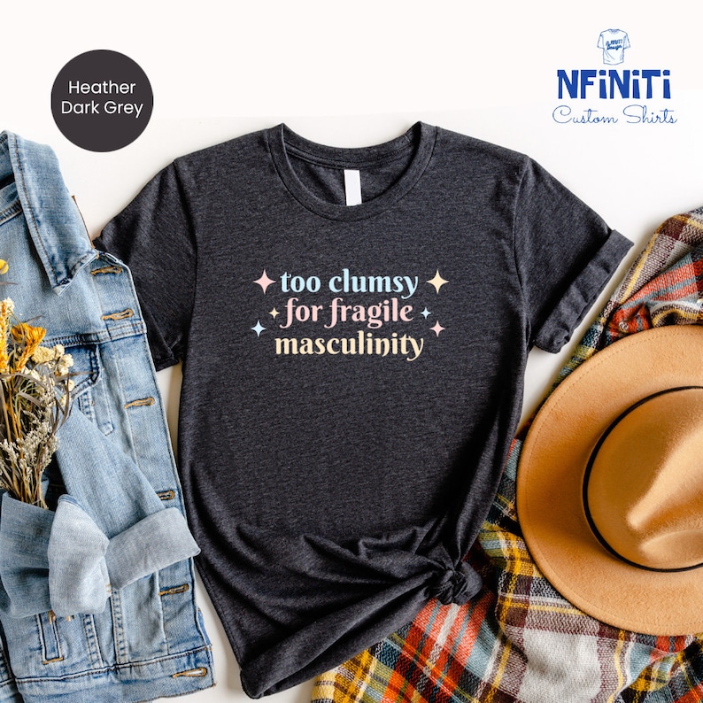 a t - shirt that says too clumpy for fragile masculiniity