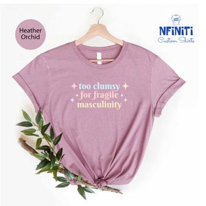 a t - shirt with the words too chummy for fragile masculiniity