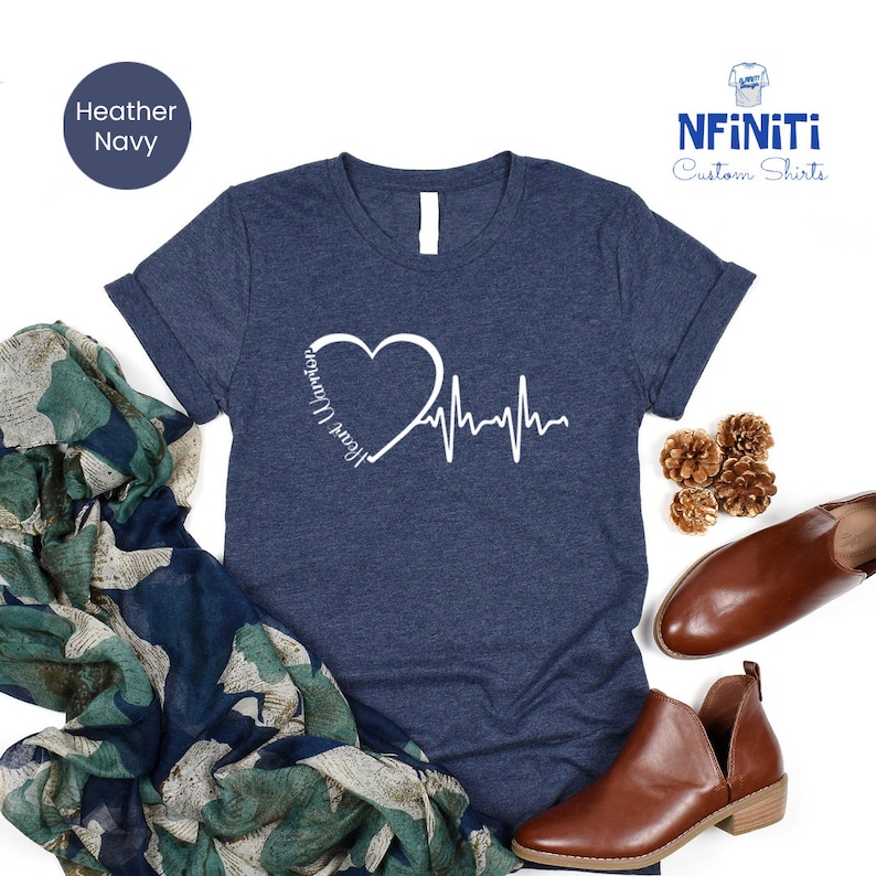 a t - shirt with a heart and heartbeat on it