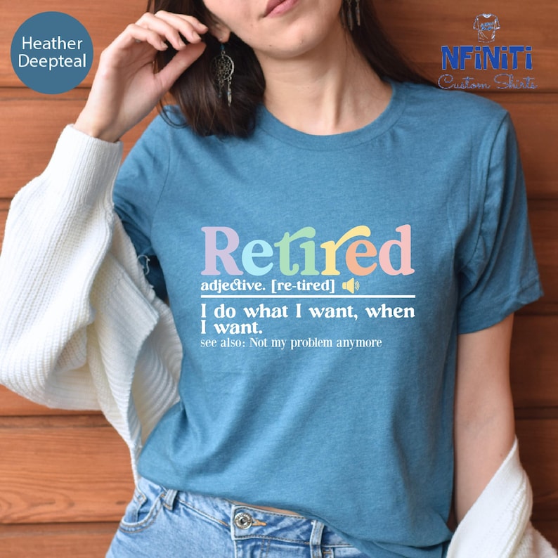 a woman wearing a t - shirt that says retired