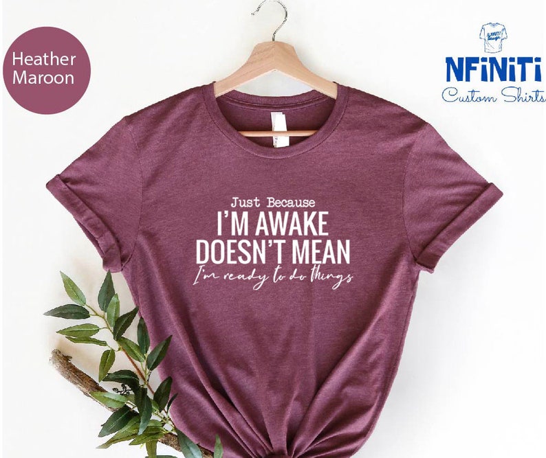 a t - shirt with the words i'm awake doesn't mean i
