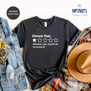 a t - shirt that says chronic pain, absolute crap, would not recommend