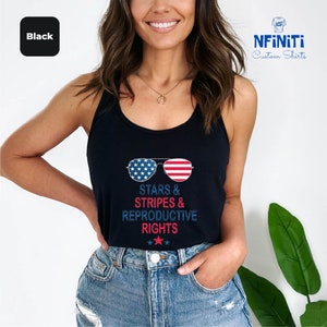a woman wearing a tank top that says stars, stripes, and republican rights