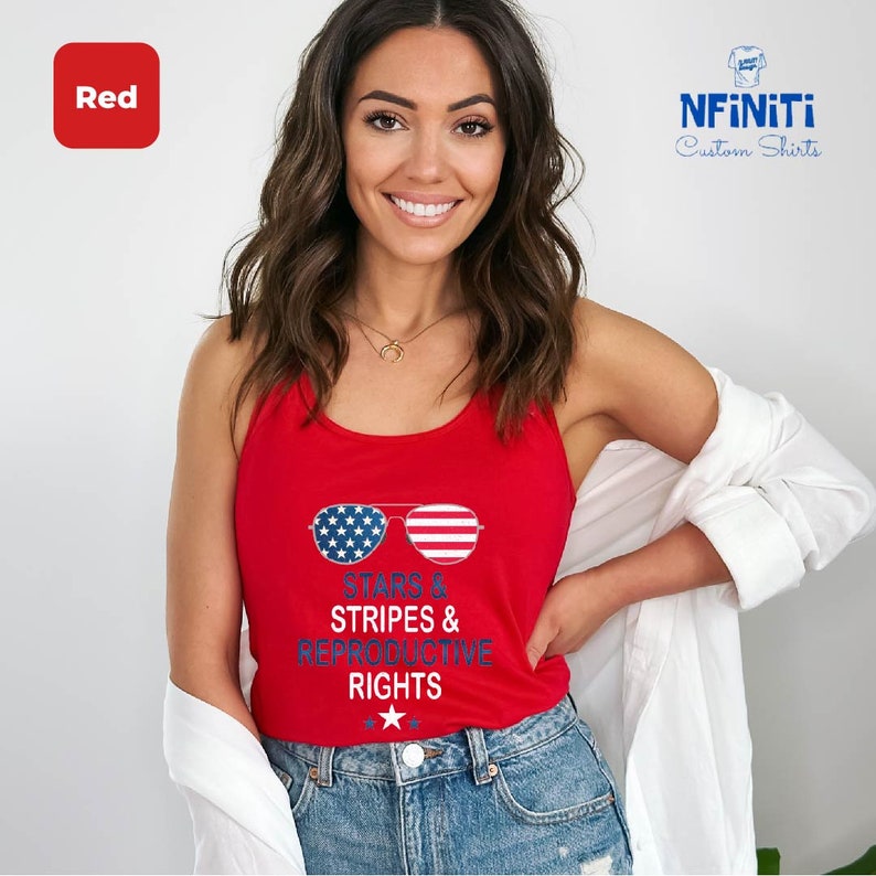 a woman wearing a red tank top that says stripes and rights
