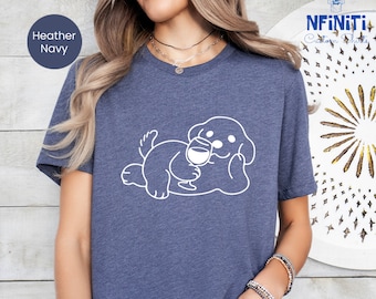 May include: Heather navy blue t-shirt with a white outline of a dog holding a glass of wine.