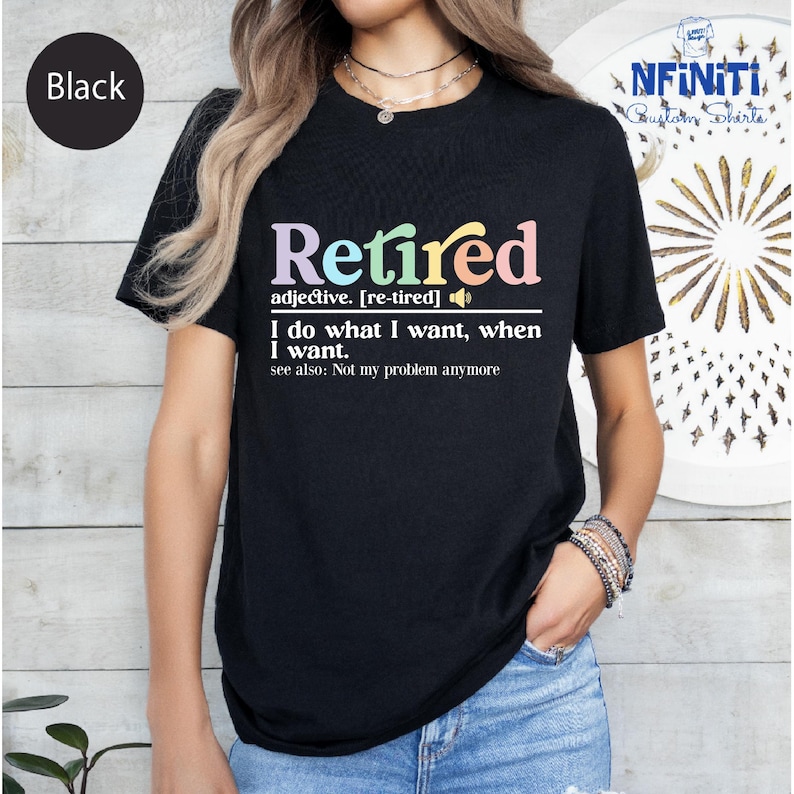 a woman wearing a black t - shirt that says retired