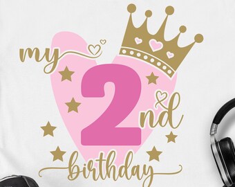 May include: A pink heart with a gold crown on top and the number 2 inside. The text "my 2nd birthday" is written below the heart.