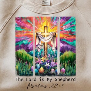 May include: A colorful digital art print featuring a cross with a white cloth draped over it, surrounded by flowers and Easter eggs. The text "The Lord is My Shepherd Psalms 23:1" is at the bottom of the print.