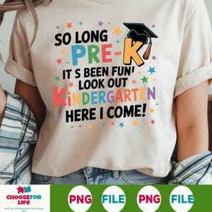 May include: Cream-colored t-shirt with the text "SO LONG PRE-K IT'S BEEN FUN! LOOK OUT KINDERGARTEN HERE I COME!" in various colors and a graduation cap graphic. The shirt is a casual style.