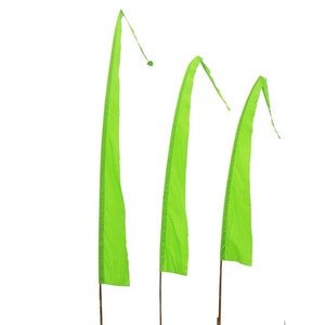 May include: Three green fabric pennants with pointed ends, hanging from wooden poles against a white background.