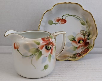 Nippon 2 Piece Creamer and Small Plate. Lots of gold gilt, hand painted. Beautiful rich colors, Poppy Flower