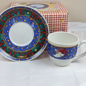 Mary Engelbreit Time For Tea Cup & Saucer Set  BELIEVE Christmas Santa