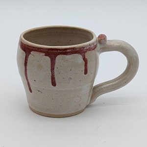 Studio Pottery Mug in Beige with Red Drip Glaze Around Rim