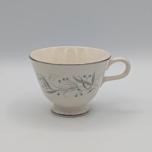 HLC - Eggshell Cavalier Celeste Pattern Platinum Trimmed China Tea Cup