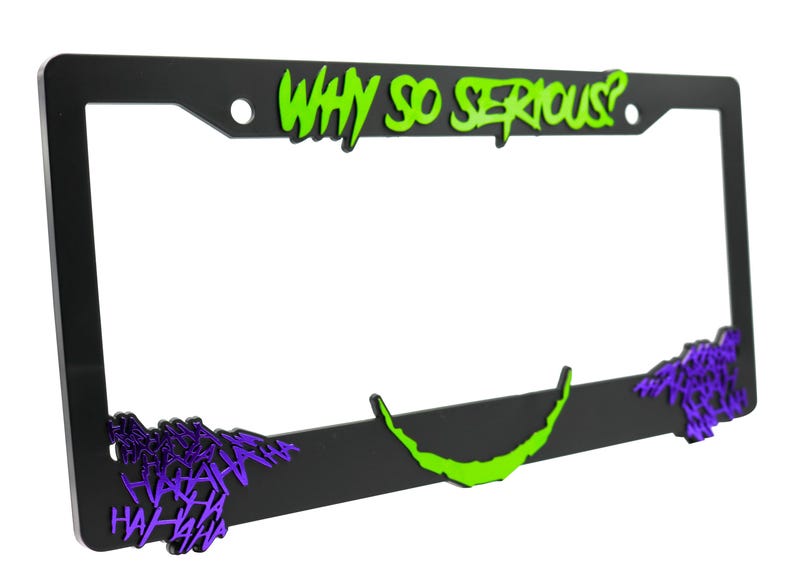 May include: Black license plate frame with a green "Why So Serious?" text and purple "Ha Ha Ha" text.