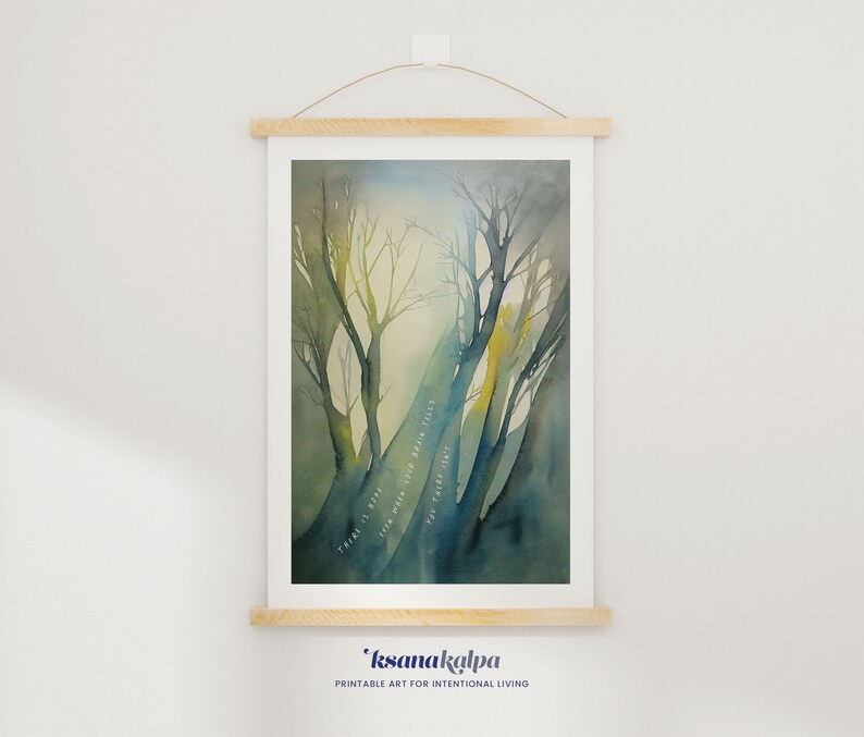 May include: A watercolor painting of a forest scene with a blue and green color scheme. The trees are silhouetted against a light blue sky. The text "Pain is rare, Joy is with you more than you think, The peace is in you, This moment is yours" is written in white on the trees.