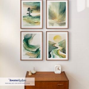 Puede incluir: Cuatro pinturas de acuarela enmarcadas en tonos verdes y amarillos. Las pinturas representan escenas de la naturaleza con &aacute;rboles, monta&ntilde;as y agua. Los marcos son de madera marr&oacute;n claro.