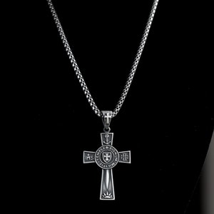 May include: Silver chain necklace with a silver cross pendant. The cross features a circular design with the words "TEMPLI SIGNUM" and "IHHS" around the edge. The center of the cross has a shield with a sword and a cross.