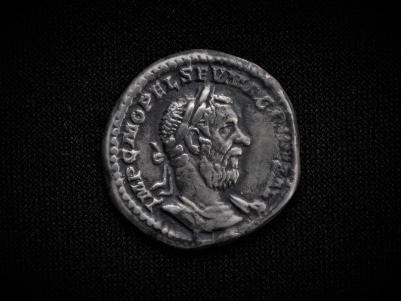 silver coin Denarius of the Roman Emperor Macrinus RIC 24 by catalog. Cast from a genuine coin. image 1