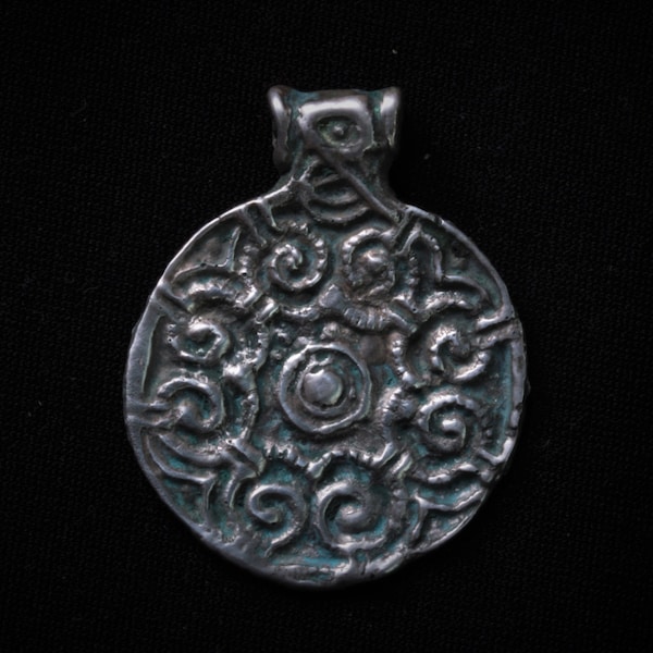 Pagan protective amulet "Solar pendant" in the style of the Viking Age of the 9th-11th centuries. Cast from a genuine Viking artifact.